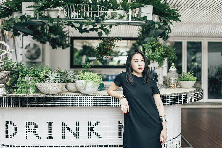 Every venue is sophisticated yet irreverently fun. Here, group communications manager Tania Chan (she's behind the cheeky campaigns) at gin bar The White Rabbit